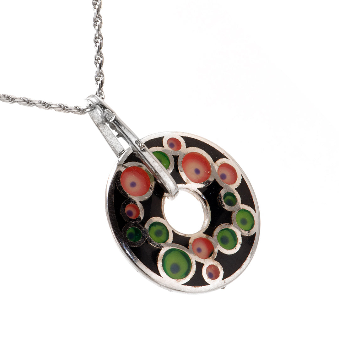 Black Doughnut Shaped Silver Pendant with Colorful Patterns